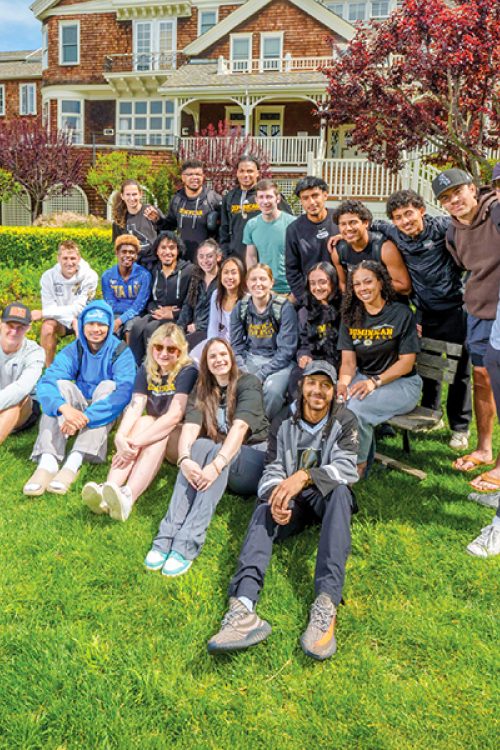 group of students in front of meadowlands hall