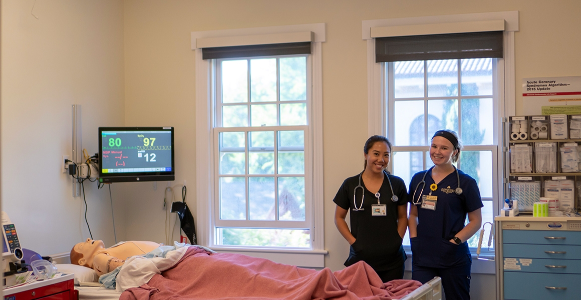Two nursing students in Dominican's clinical simulation lab.