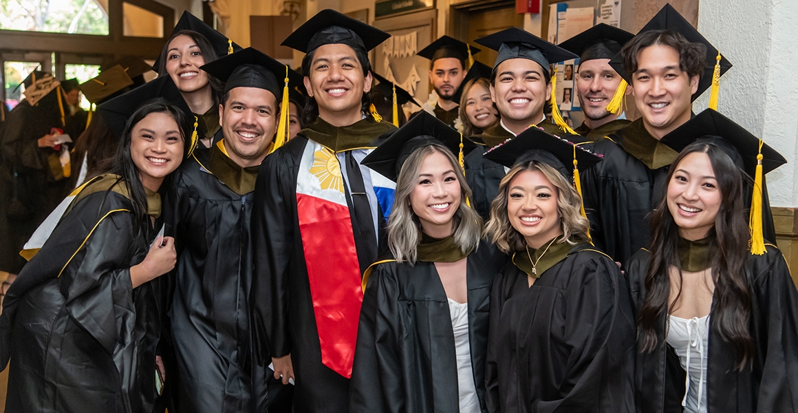 group of students at graduation celebrating