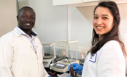 sevil chelebieva and other person smiling at camera