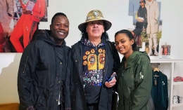 yema klalif and hawi awash pose with carlos santana at tiburon store