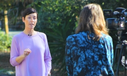 Photo of Global Public Health professor Michaela George (right) being interviewed by KGO-TV ABC7 reporter Liz Kreutz 