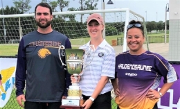 Group photo of Haudenosaunee National Team coaching led by (left to right) Dominican women's lacrosse coach Joseph Manna, Liv Bevelle and Naomi Walser 