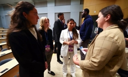 women talking at an event