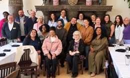 group of Dominican alumni gathered at a restaurant in Sacramento