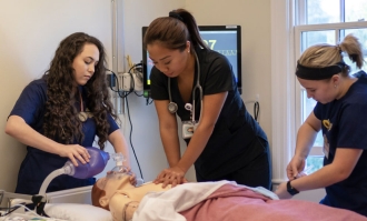 Dominican nursing students in SIM lab.