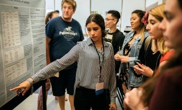 a female student presenting research