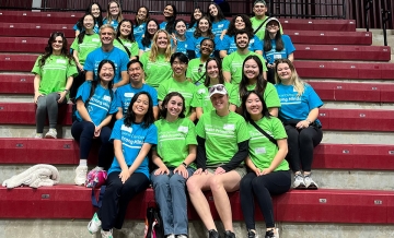 A group of students from the Dominican University of Californina Physician Assistant program pose for a photograph at a Special Olympics event.