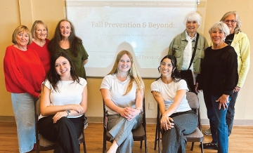 Occupational Therapy students during a fall prevention presentation for older adults.