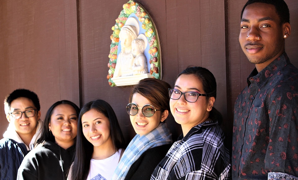 six dominican students posing with della robbia sculpture