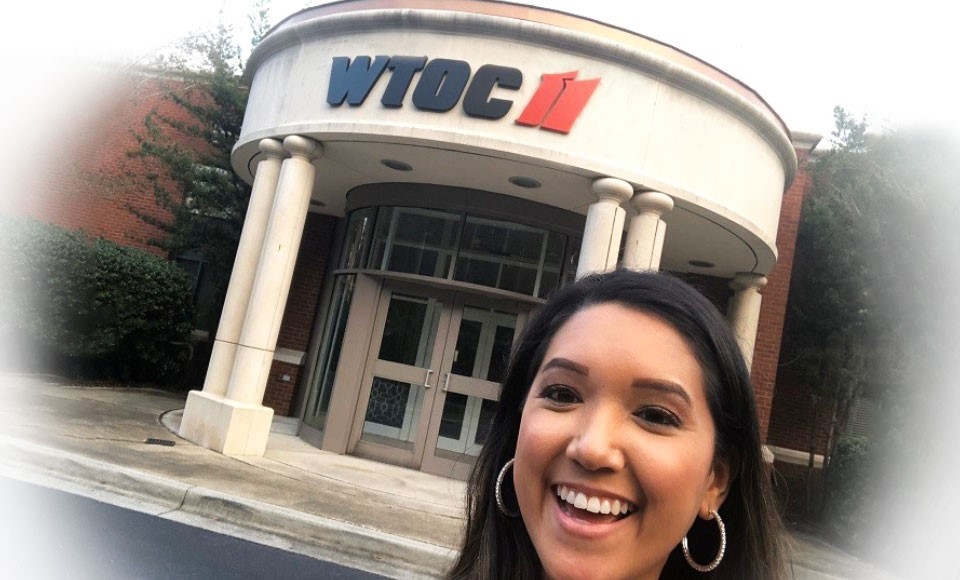 Selfie photo of Amanda Aguilar '13 smiling outside WTOC 